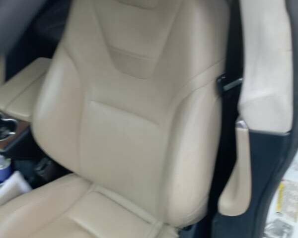 Белый Тесла Модель С, объемом двигателя 0 л и пробегом 143 тыс. км за 15699 $, фото 4 на Automoto.ua