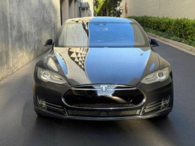 Чорний Тесла Модель С, об'ємом двигуна 0 л та пробігом 120 тис. км за 10000 $, фото 2 на Automoto.ua