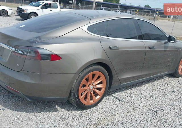 Коричневый Тесла Модель С, объемом двигателя 0 л и пробегом 199 тыс. км за 9999 $, фото 3 на Automoto.ua