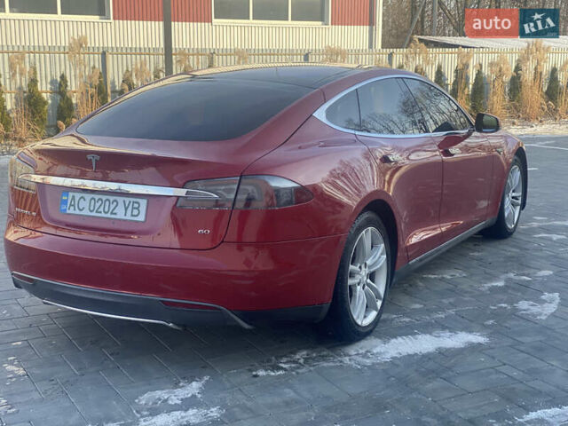 Красный Тесла Модель С, объемом двигателя 0 л и пробегом 125 тыс. км за 12200 $, фото 3 на Automoto.ua