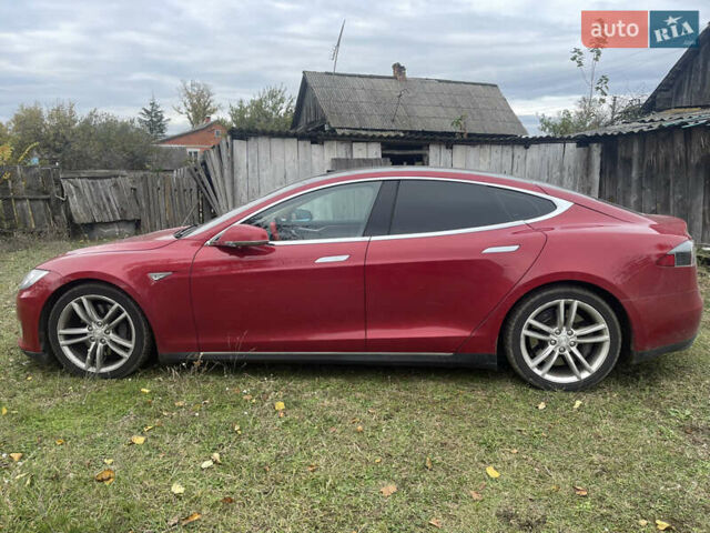 Красный Тесла Модель С, объемом двигателя 0 л и пробегом 140 тыс. км за 15000 $, фото 1 на Automoto.ua