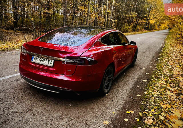 Красный Тесла Модель С, объемом двигателя 0 л и пробегом 150 тыс. км за 11862 $, фото 1 на Automoto.ua