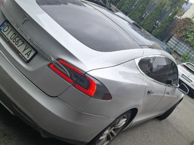 Серый Тесла Модель С, объемом двигателя 0 л и пробегом 170 тыс. км за 6000 $, фото 1 на Automoto.ua