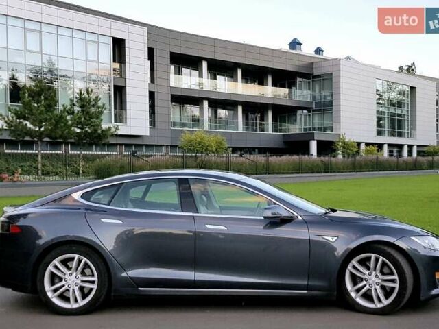 Серый Тесла Модель С, объемом двигателя 0 л и пробегом 85 тыс. км за 24900 $, фото 1 на Automoto.ua
