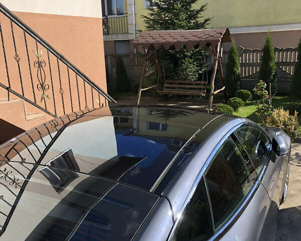 Серый Тесла Модель С, объемом двигателя 0 л и пробегом 113 тыс. км за 15200 $, фото 2 на Automoto.ua