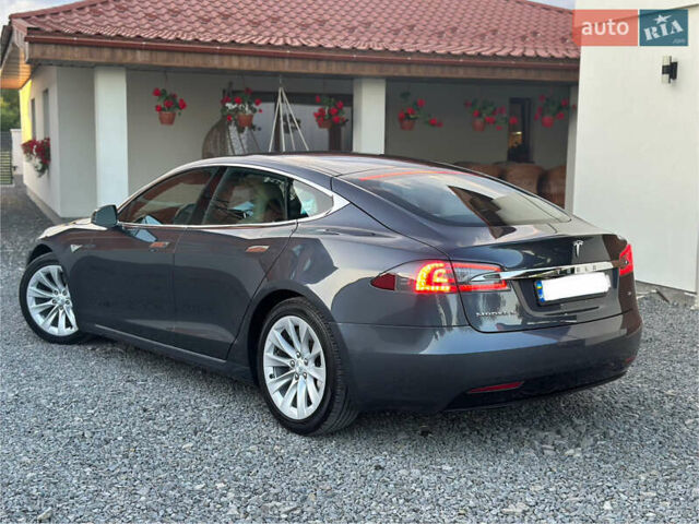 Серый Тесла Модель С, объемом двигателя 0 л и пробегом 165 тыс. км за 15500 $, фото 1 на Automoto.ua