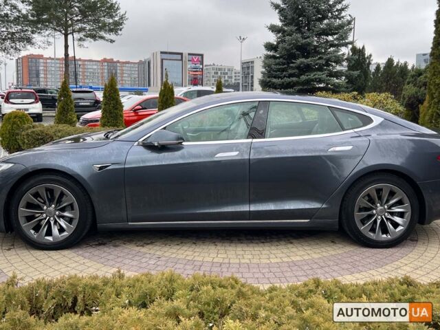 Серый Тесла Модель С, объемом двигателя 100 л и пробегом 168 тыс. км за 23700 $, фото 3 на Automoto.ua
