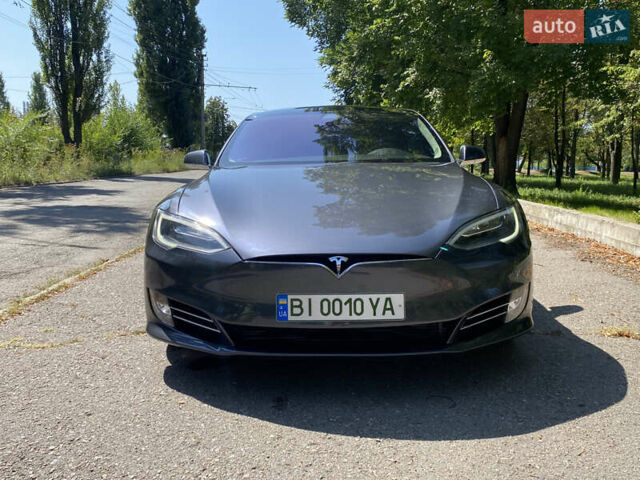 Серый Тесла Модель С, объемом двигателя 0 л и пробегом 87 тыс. км за 26000 $, фото 2 на Automoto.ua