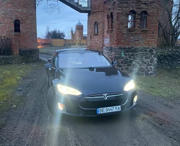 Синий Тесла Модель С, объемом двигателя 0 л и пробегом 99 тыс. км за 14950 $, фото 3 на Automoto.ua