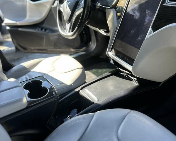 Синий Тесла Модель С, объемом двигателя 0 л и пробегом 144 тыс. км за 13400 $, фото 16 на Automoto.ua