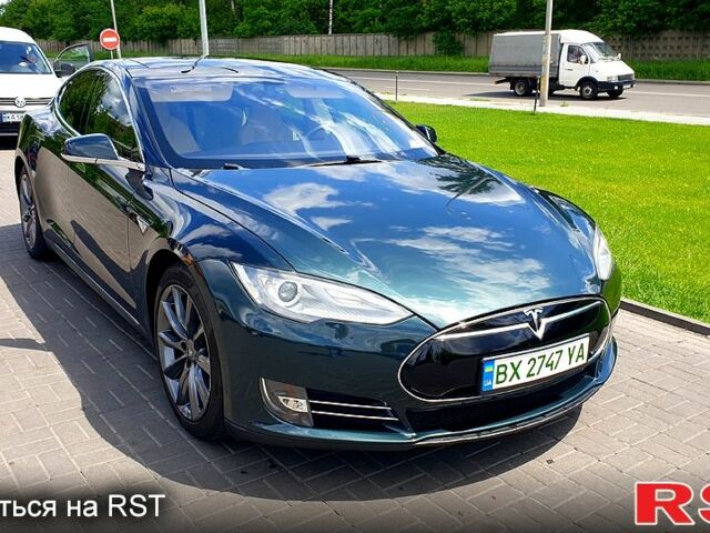 Зеленый Тесла Модель С, объемом двигателя 0 л и пробегом 244 тыс. км за 12700 $, фото 1 на Automoto.ua