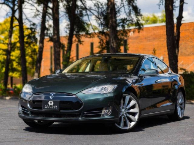 Зеленый Тесла Модель С, объемом двигателя 0 л и пробегом 86 тыс. км за 3500 $, фото 2 на Automoto.ua