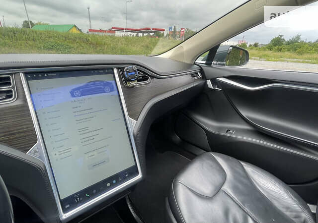 Зелений Тесла Модель С, об'ємом двигуна 0 л та пробігом 135 тис. км за 24999 $, фото 39 на Automoto.ua