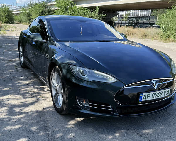 Зеленый Тесла Модель С, объемом двигателя 0 л и пробегом 115 тыс. км за 12300 $, фото 1 на Automoto.ua