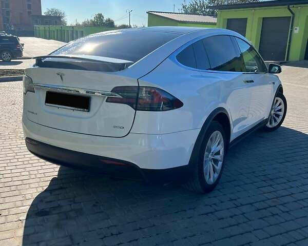 Белый Тесла Модель Х, объемом двигателя 0 л и пробегом 110 тыс. км за 21000 $, фото 2 на Automoto.ua