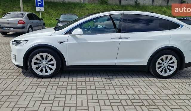 Белый Тесла Модель Х, объемом двигателя 0 л и пробегом 93 тыс. км за 25756 $, фото 44 на Automoto.ua