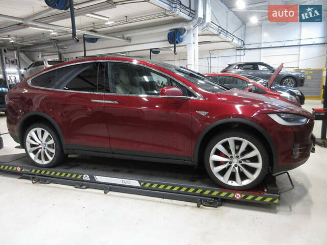 Красный Тесла Модель Х, объемом двигателя 0 л и пробегом 153 тыс. км за 23900 $, фото 1 на Automoto.ua