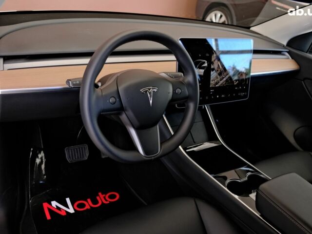 Белый Тесла Model Y, объемом двигателя 4.25 л и пробегом 19 тыс. км за 32900 $, фото 5 на Automoto.ua