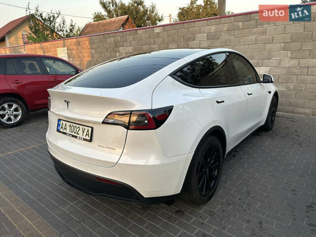 Білий Тесла Model Y, об'ємом двигуна 0 л та пробігом 63 тис. км за 34999 $, фото 8 на Automoto.ua