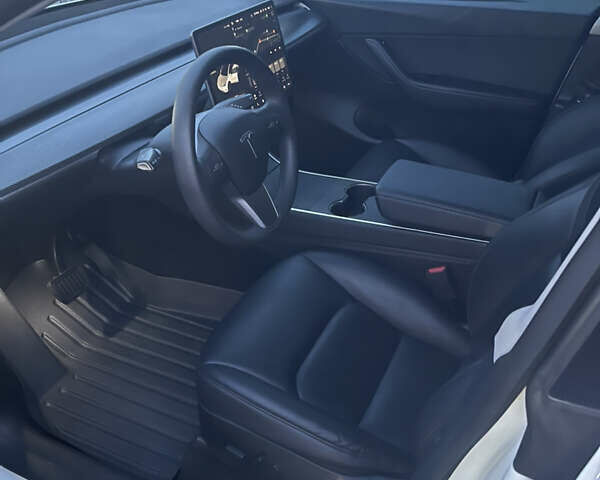 Білий Тесла Model Y, об'ємом двигуна 0 л та пробігом 63 тис. км за 34999 $, фото 16 на Automoto.ua
