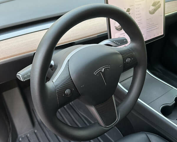 Білий Тесла Model Y, об'ємом двигуна 0 л та пробігом 63 тис. км за 34999 $, фото 12 на Automoto.ua