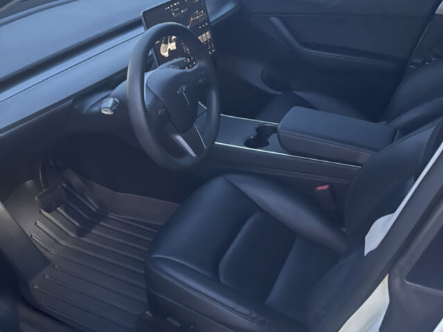 Білий Тесла Model Y, об'ємом двигуна 0 л та пробігом 63 тис. км за 34999 $, фото 15 на Automoto.ua