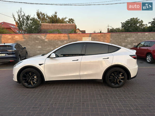 Білий Тесла Model Y, об'ємом двигуна 0 л та пробігом 63 тис. км за 34999 $, фото 2 на Automoto.ua