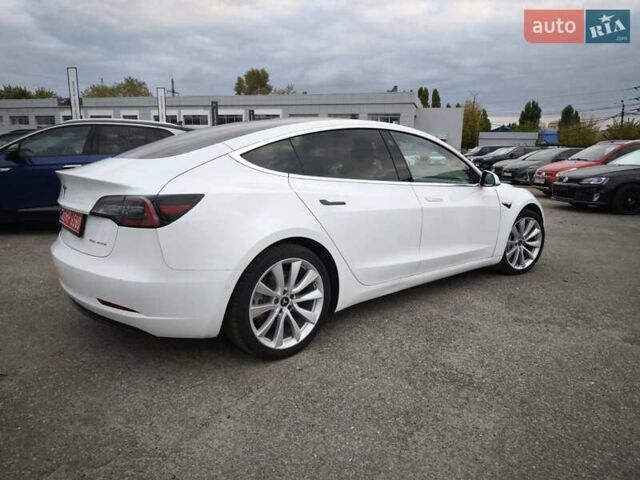 Белый Тесла Model Y, объемом двигателя 0 л и пробегом 126 тыс. км за 19999 $, фото 24 на Automoto.ua