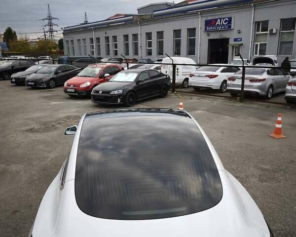 Белый Тесла Model Y, объемом двигателя 0 л и пробегом 126 тыс. км за 19999 $, фото 12 на Automoto.ua
