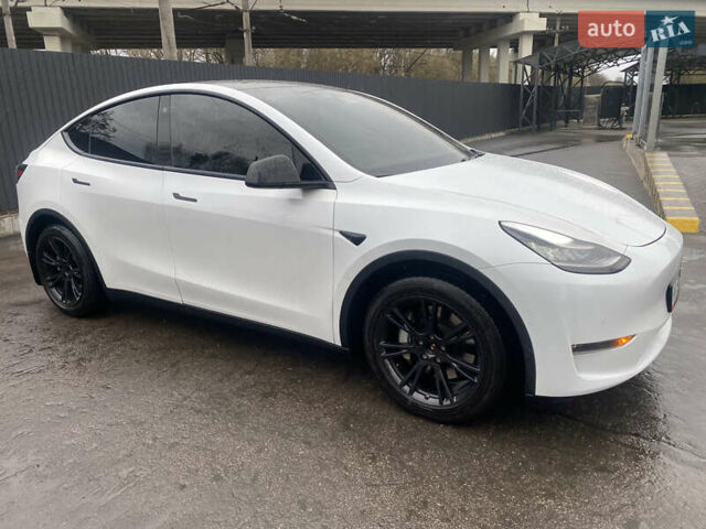 Білий Тесла Model Y, об'ємом двигуна 0 л та пробігом 70 тис. км за 24500 $, фото 2 на Automoto.ua