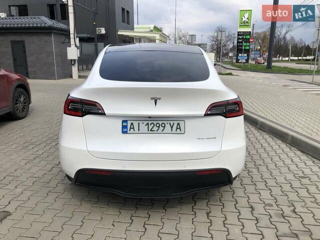 Белый Тесла Model Y, объемом двигателя 0 л и пробегом 51 тыс. км за 26000 $, фото 4 на Automoto.ua