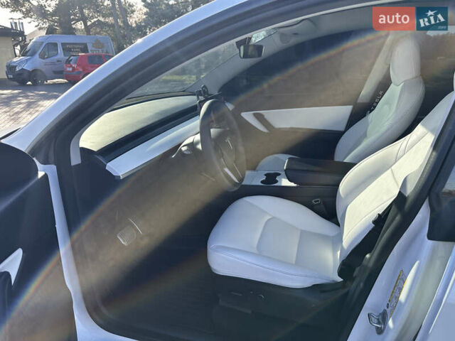 Белый Тесла Model Y, объемом двигателя 0 л и пробегом 85 тыс. км за 22900 $, фото 17 на Automoto.ua