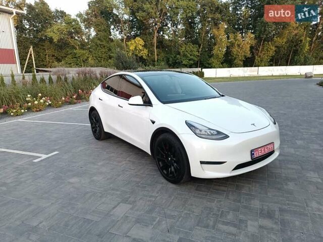 Белый Тесла Model Y, объемом двигателя 0 л и пробегом 128 тыс. км за 19600 $, фото 2 на Automoto.ua