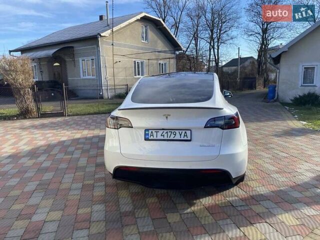 Белый Тесла Model Y, объемом двигателя 0 л и пробегом 113 тыс. км за 24700 $, фото 42 на Automoto.ua