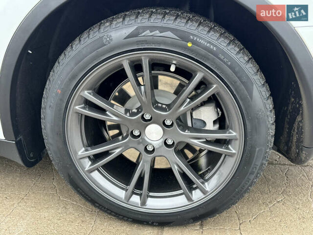 Белый Тесла Model Y, объемом двигателя 0 л и пробегом 77 тыс. км за 25000 $, фото 34 на Automoto.ua