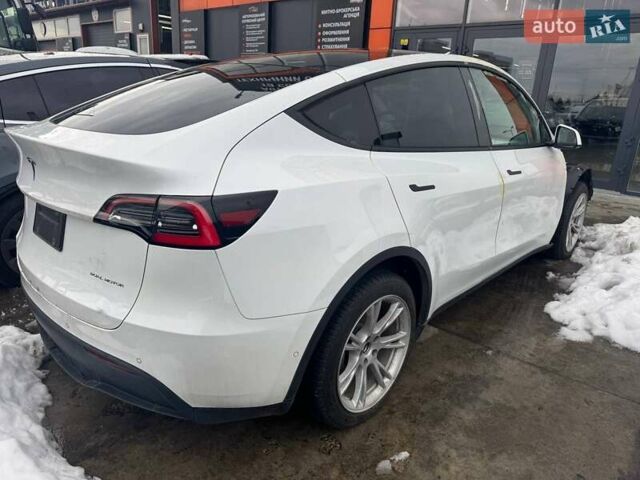 Белый Тесла Model Y, объемом двигателя 0 л и пробегом 98 тыс. км за 15000 $, фото 5 на Automoto.ua