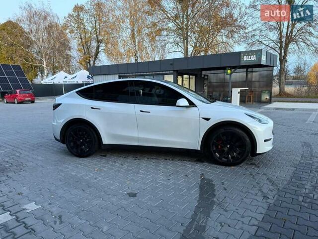 Белый Тесла Model Y, объемом двигателя 0 л и пробегом 132 тыс. км за 20800 $, фото 126 на Automoto.ua
