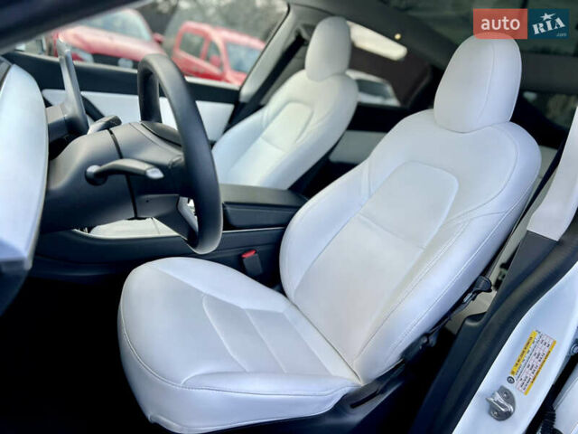 Белый Тесла Model Y, объемом двигателя 0 л и пробегом 57 тыс. км за 28500 $, фото 26 на Automoto.ua