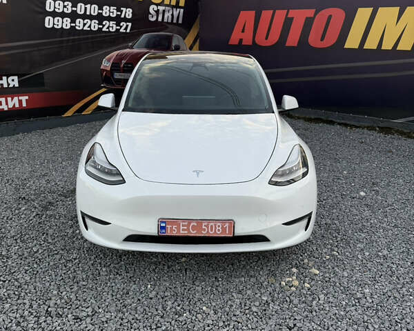 Білий Тесла Model Y, об'ємом двигуна 0 л та пробігом 100 тис. км за 21499 $, фото 33 на Automoto.ua
