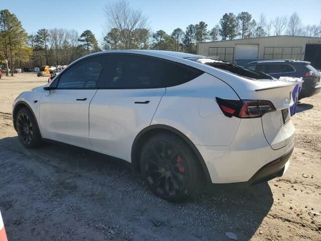 Белый Тесла Model Y, объемом двигателя 0 л и пробегом 131 тыс. км за 18300 $, фото 3 на Automoto.ua