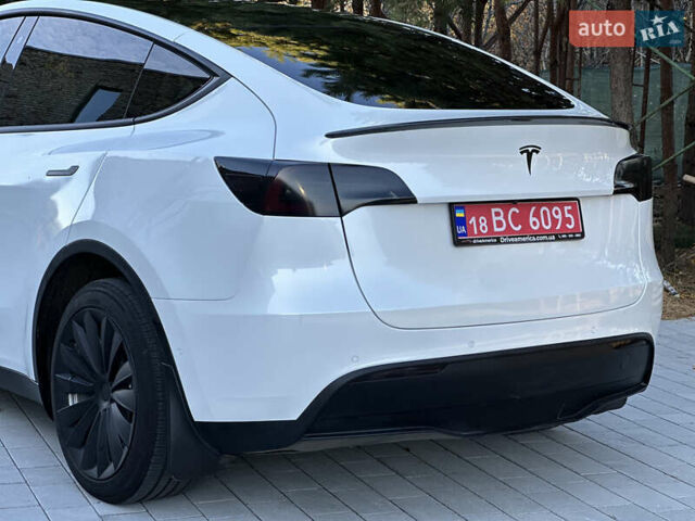 Белый Тесла Model Y, объемом двигателя 0 л и пробегом 118 тыс. км за 21700 $, фото 19 на Automoto.ua