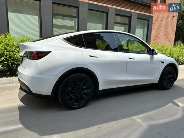 Белый Тесла Model Y, объемом двигателя 0 л и пробегом 53 тыс. км за 23500 $, фото 21 на Automoto.ua