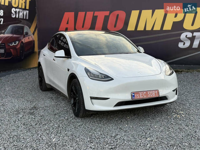 Білий Тесла Model Y, об'ємом двигуна 0 л та пробігом 100 тис. км за 21499 $, фото 4 на Automoto.ua