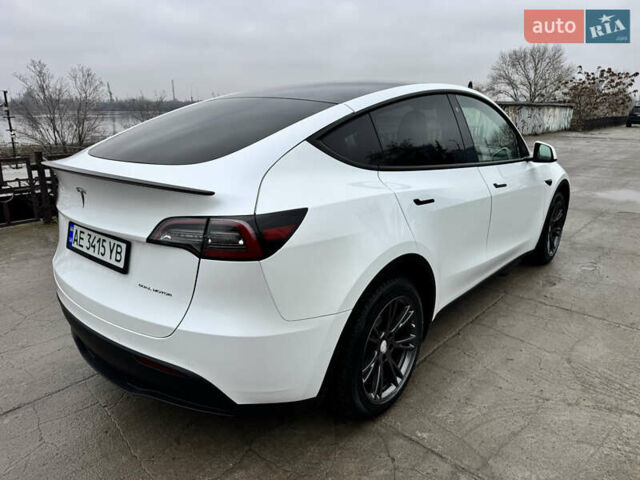 Белый Тесла Model Y, объемом двигателя 0 л и пробегом 77 тыс. км за 25000 $, фото 38 на Automoto.ua