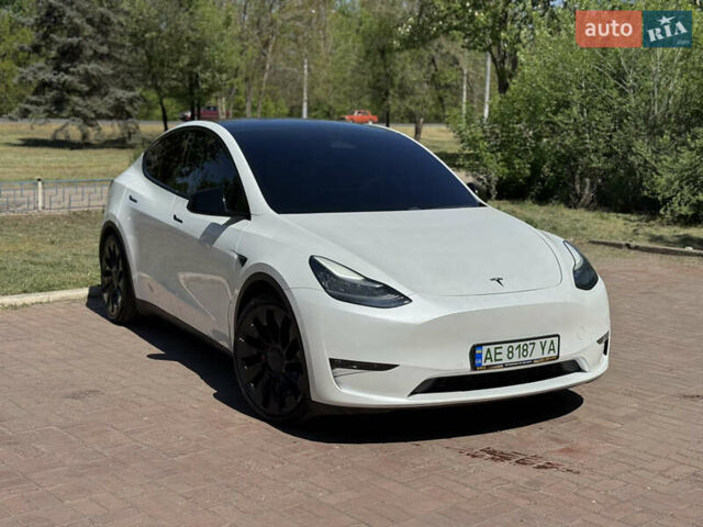 Белый Тесла Model Y, объемом двигателя 0 л и пробегом 84 тыс. км за 28000 $, фото 26 на Automoto.ua