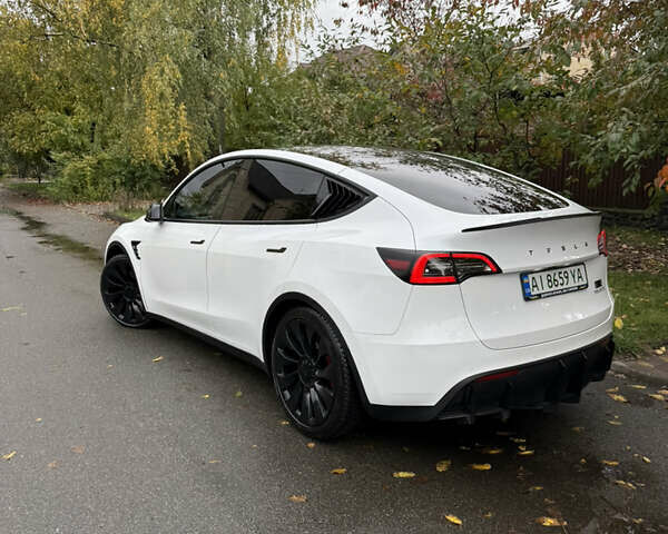 Белый Тесла Model Y, объемом двигателя 0 л и пробегом 62 тыс. км за 28500 $, фото 3 на Automoto.ua