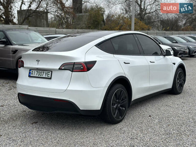 Білий Тесла Model Y, об'ємом двигуна 0 л та пробігом 66 тис. км за 19500 $, фото 19 на Automoto.ua