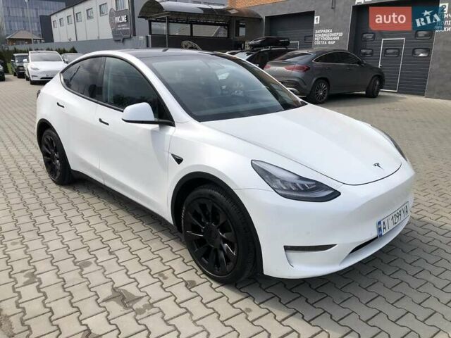 Белый Тесла Model Y, объемом двигателя 0 л и пробегом 51 тыс. км за 26000 $, фото 2 на Automoto.ua