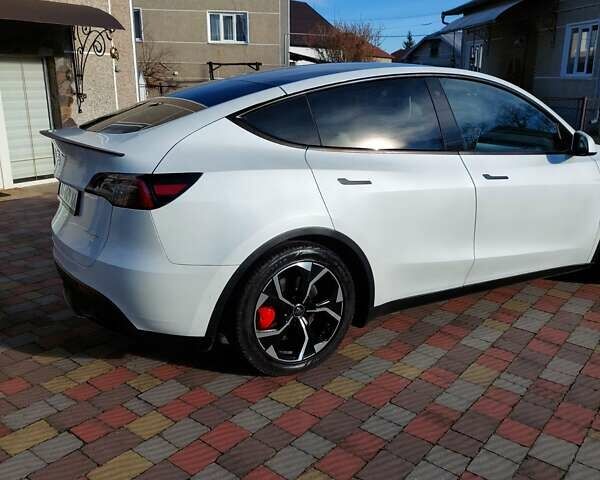 Белый Тесла Model Y, объемом двигателя 0 л и пробегом 113 тыс. км за 24700 $, фото 47 на Automoto.ua