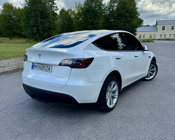 Білий Тесла Model Y, об'ємом двигуна 0 л та пробігом 100 тис. км за 23400 $, фото 5 на Automoto.ua